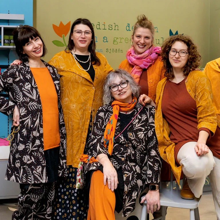 Women wearing colourful clothes from Gudrun Sjödén’s store in Freiburg.