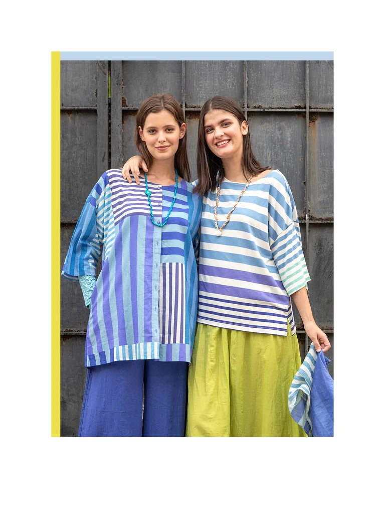 Two women wearing striped tops from Gudrun Sjödén. 