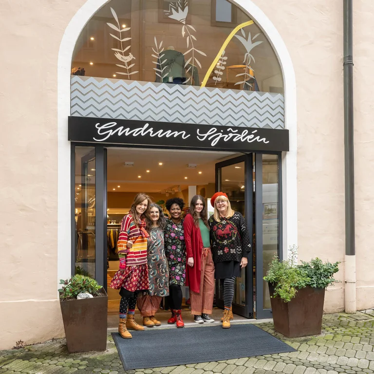 Women wearing colourful clothes from Gudrun Sjödén’s store in Nuremberg.