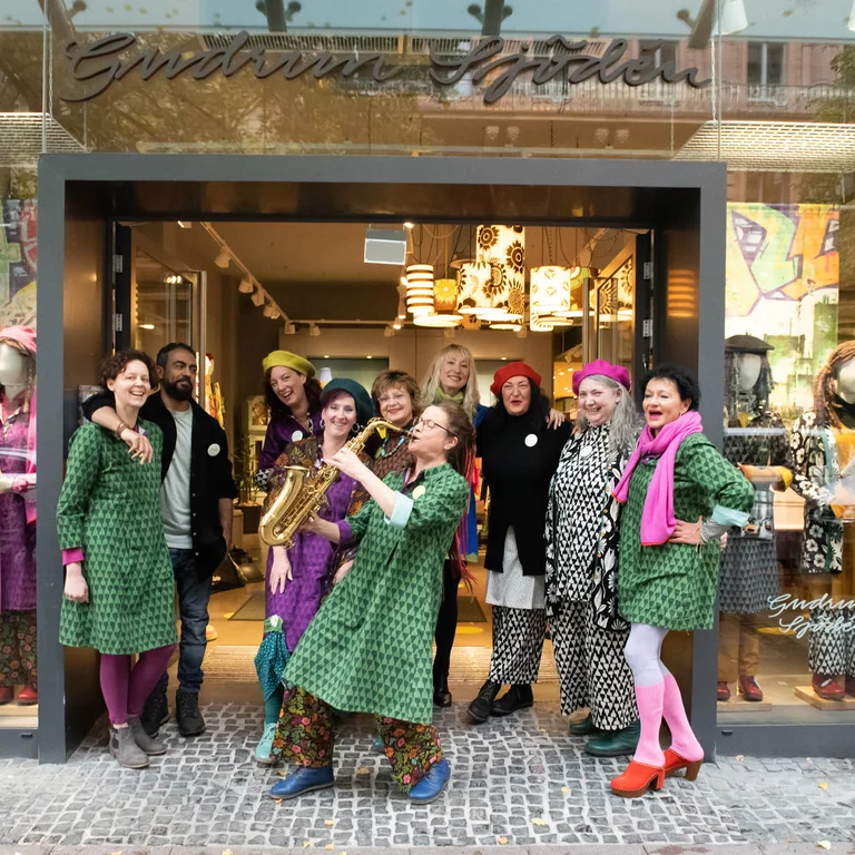 Women wearing colourful clothes from Gudrun Sjödén’s store in Frankfurt.