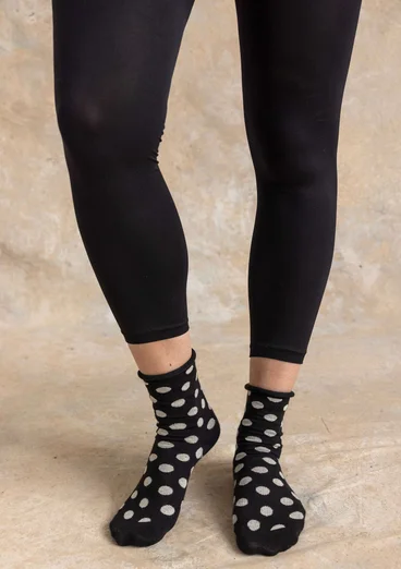 Enfärgade leggings i återvunnen polyamid - svart