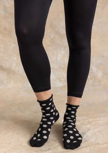 Enfärgade leggings i återvunnen polyamid - svart