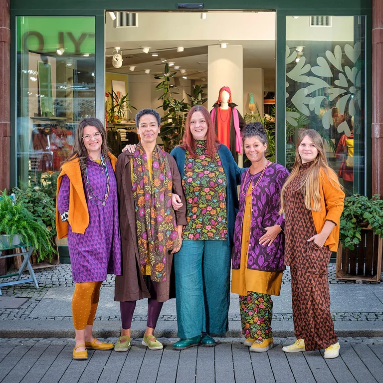 Women wearing colourful clothes from Gudrun Sjödén’s store in Leipzig.
