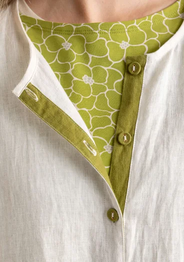 Vävd klänning i lin - halvblekt