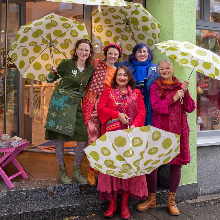 Women wearing colourful clothes from Gudrun Sjödén’s store in Munich. 