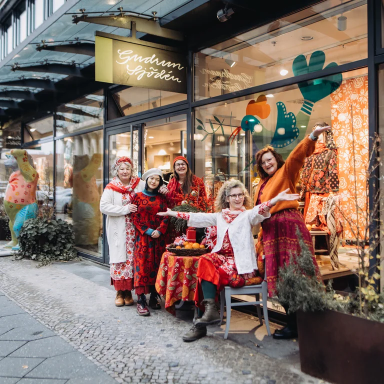 Img alt-text (staff): Women wearing colourful clothes from Gudrun Sjödén’s store in Berlin. 