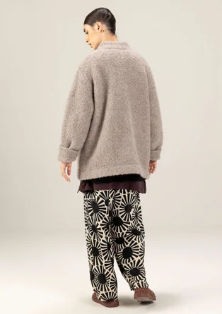 Stickad jacka i ullbouclé - ljus potatis/melange